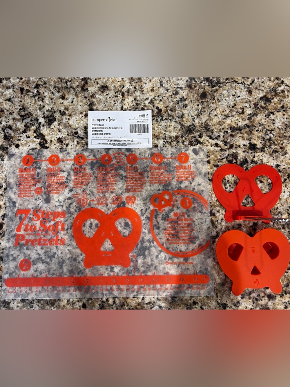 Pampered Chef Clear Pretzel Form Baking Mat with Bright Orange Accents
